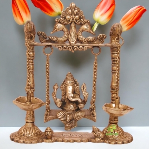 Brass Ganesha Swing with Oil Lamp with Peacock Design