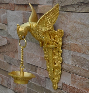 Brass made bird holding oil lamp wall diya/wall decor