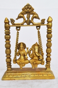 Lord Ganesha Goddess Laxmi brass metal hand made statue on a beautiful swing 